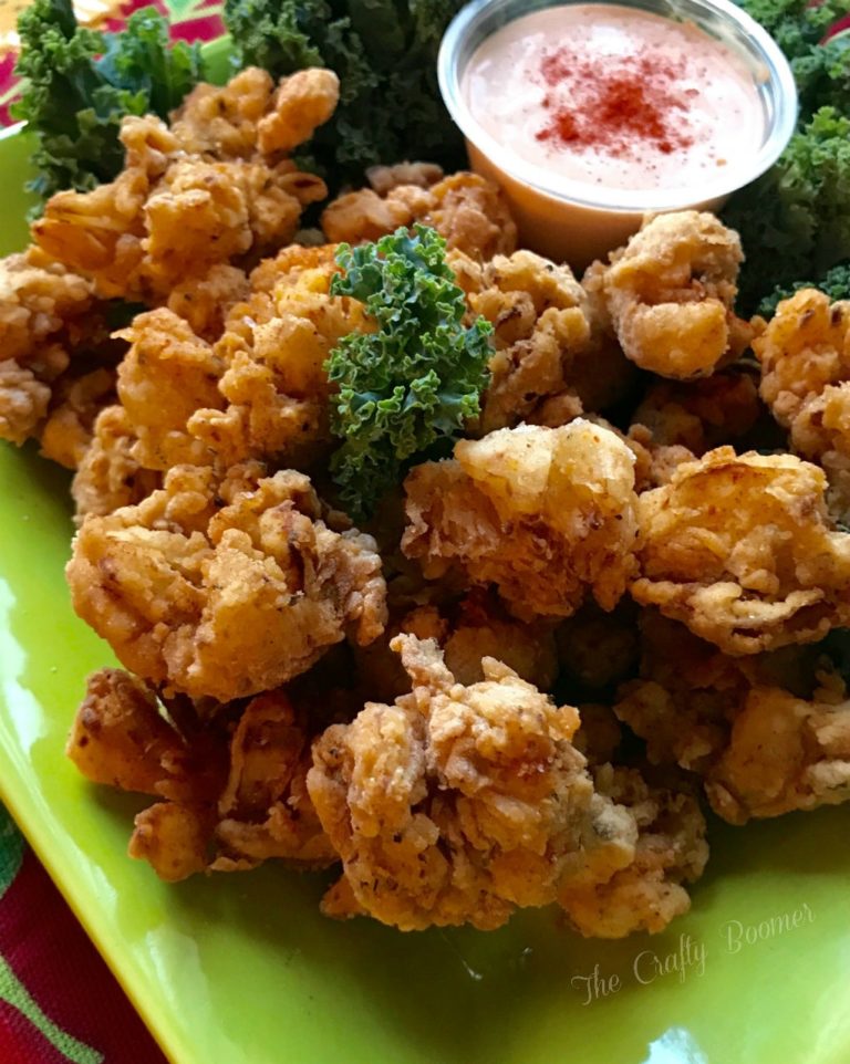 Mini crispy blooming onions are bite size crunchy goodness. They are a delicious mouthful of happiness.