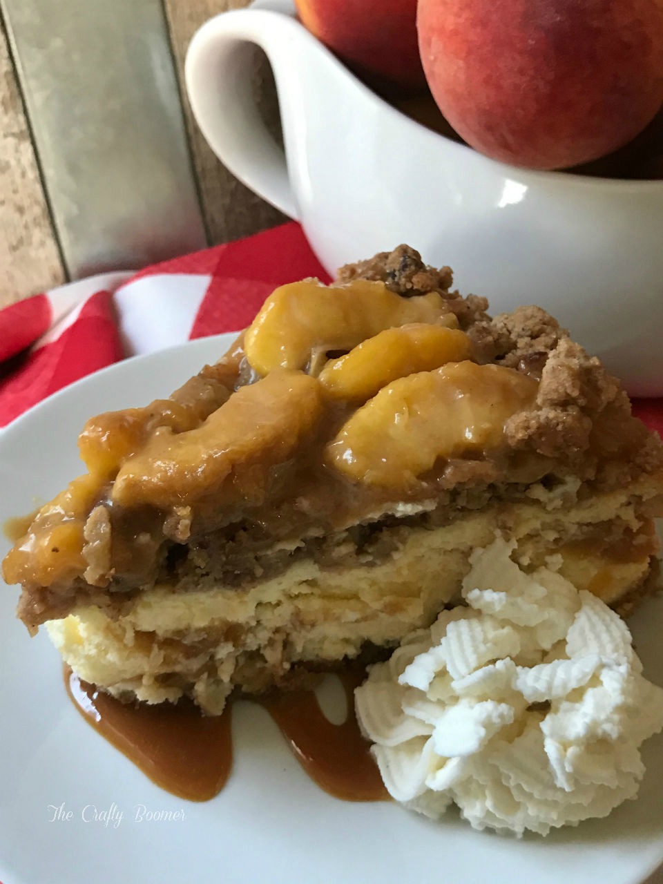 A creamy peach crumble cheesecake with a caramel topping is sure to be a hit on your dessert table.