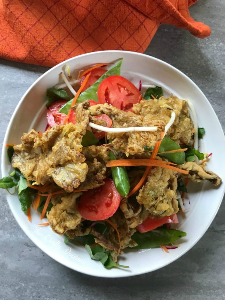 Tempura Crispy Oyster Mushroom Salad is a delicate blend of crispy and meaty flavor.