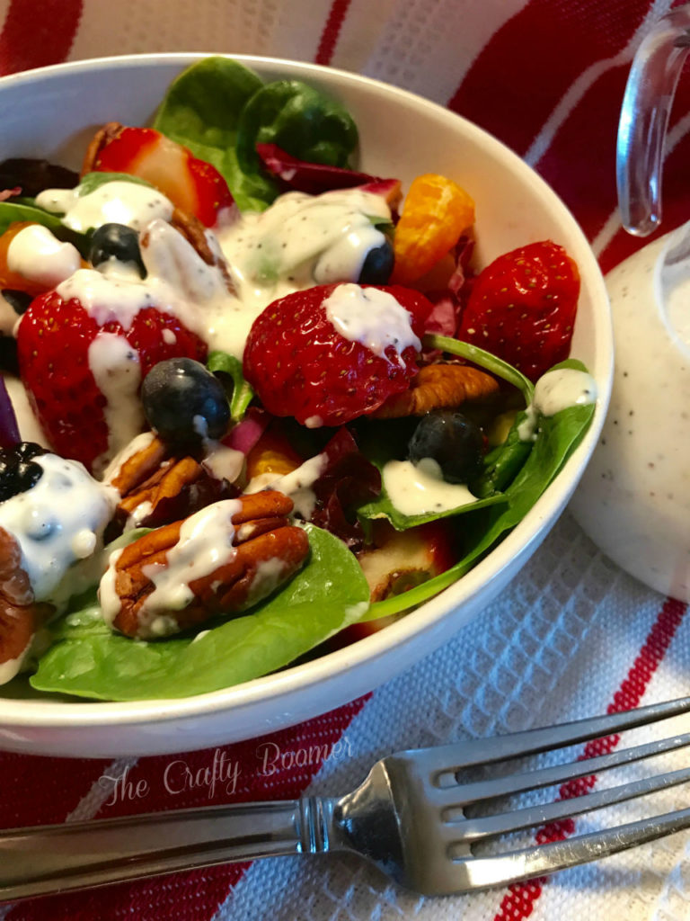 A super seedy Mixed Berry Fruit Salad that comes together in minutes. This healthy salad includes sweet berries, iron rich spinach, along with pecans which are an excellent source of minerals, vitamins, and proteins.