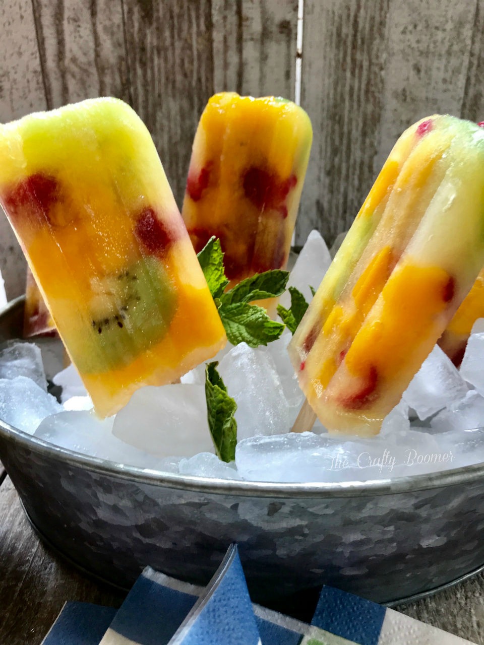 There is know better way to beat the heat than with tropical kiwi mango raspberry popsicles are delicious and nutritious.