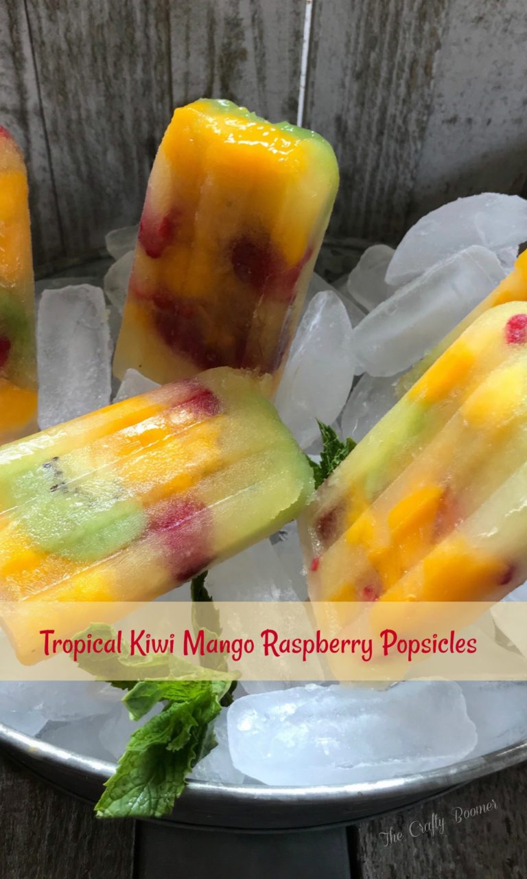 There is know better way to beat the heat than with tropical kiwi mango raspberry popsicles are delicious and nutritious.