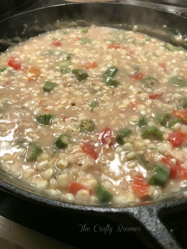 Creamy fried corn with okra and tomatoes is a sure delight to the palate.