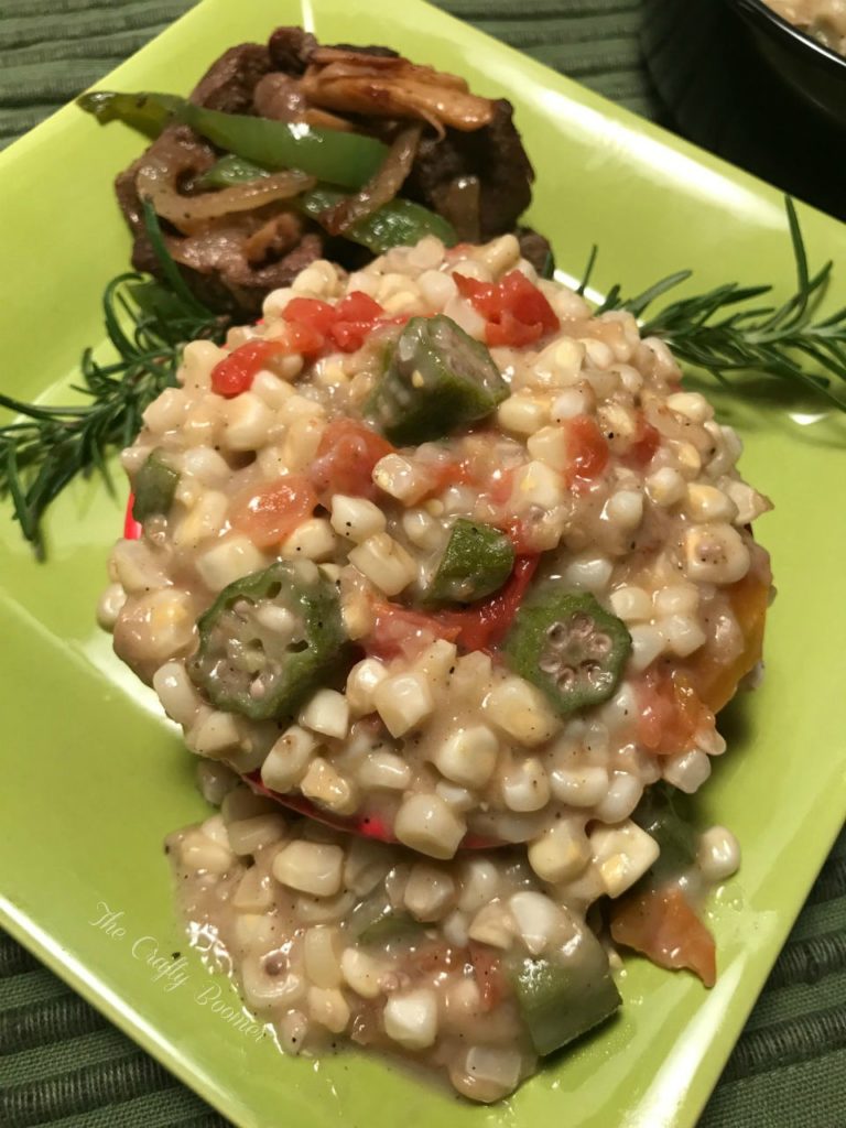 Creamy fried corn with okra and tomatoes is a sure delight to the palate.