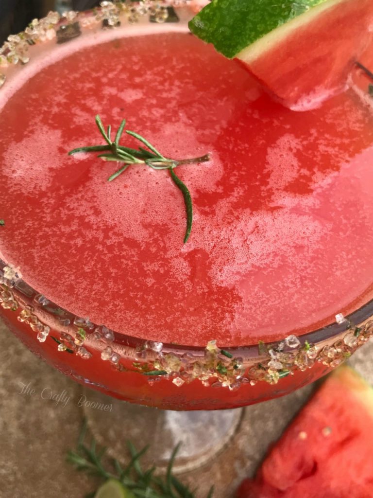 Rosemary infused watermelon margarita is literally relaxation in a glass. This cocktail has a bright fruit taste that screams summer.