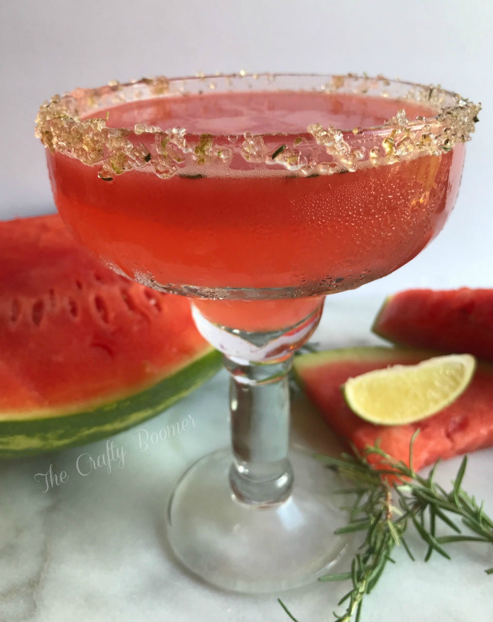 Rosemary infused watermelon margarita is literally relaxation in a glass. This cocktail has a bright fruit taste that screams summer.