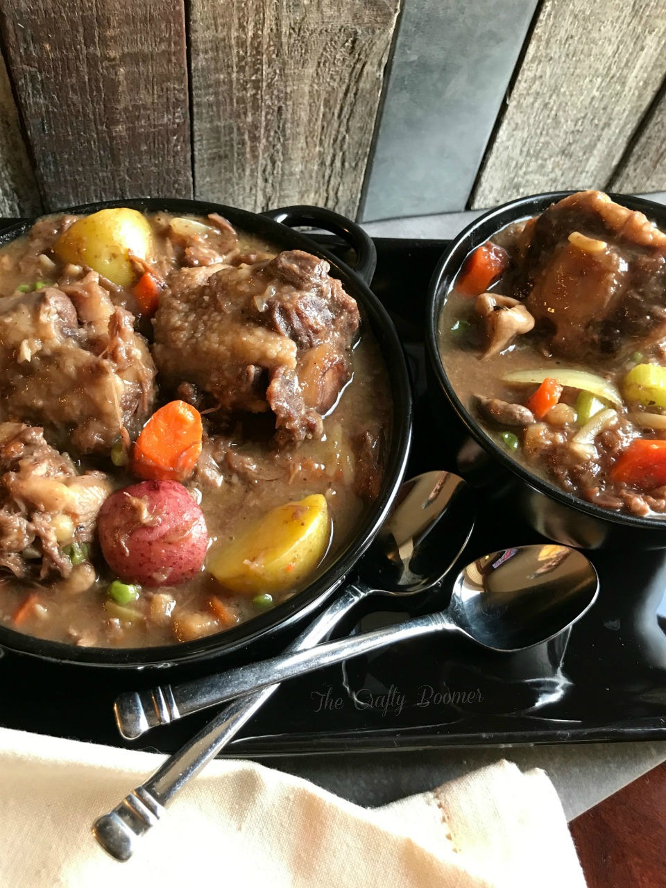 Braised Oxtails In Red Wine is slow cooked to perfection to bring about a rich bold taste you are not soon to forget.