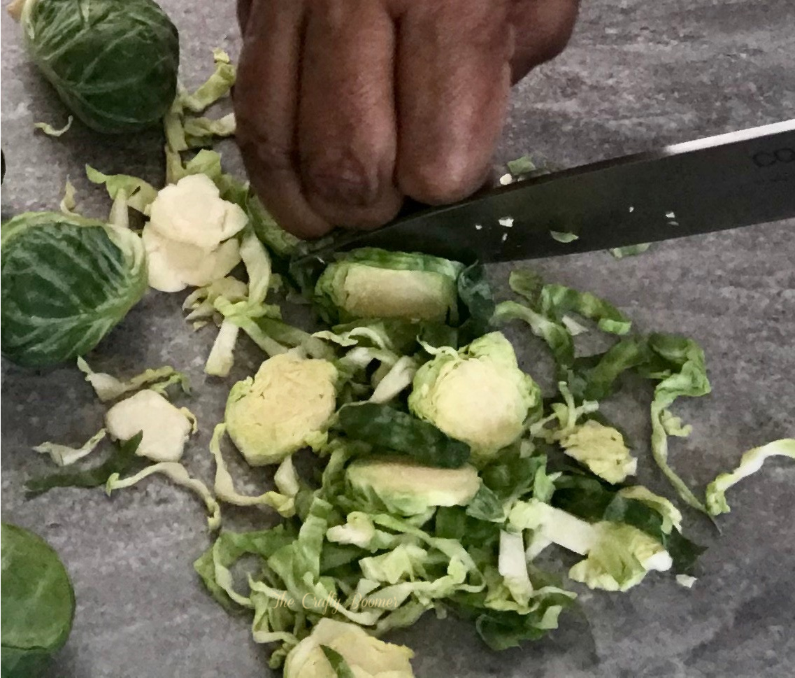 Brussel Sprouts thinly sliced with a knife.